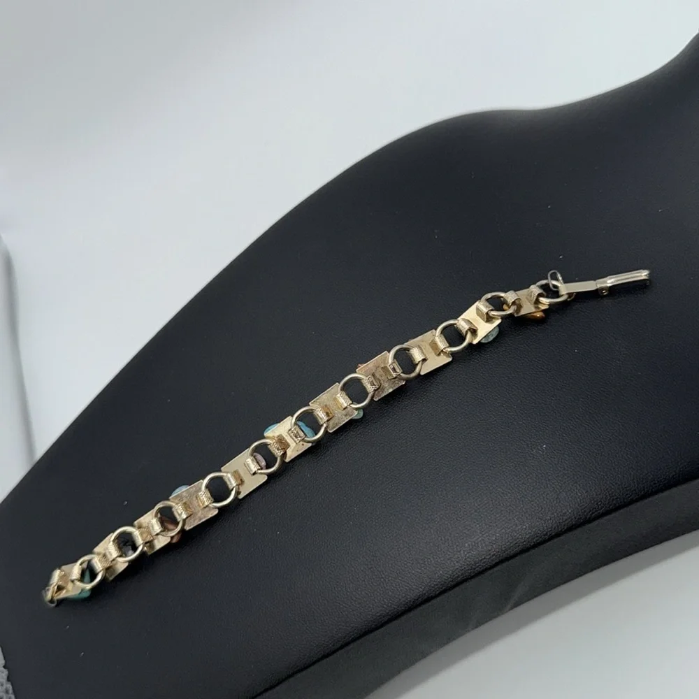 Vintage Gold tone link charm bracelet with various colored “stones” boho hippie